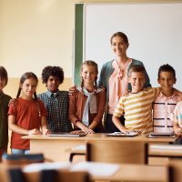 portrait-of-happy-school-kids-with-their-teacher-i-2024-12-13-19-33-29-utc (1) portrait-of-happy-school-kids-with-their-teacher-i-2024-12-13-19-33-29-utc (1)