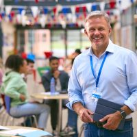 smiling-male-university-teacher-tutor-or-lecturer-2024-10-19-16-08-56-utc (1) smiling-male-university-teacher-tutor-or-lecturer-2024-10-19-16-08-56-utc (1)