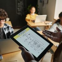 teacher-using-tablet-pc-at-lesson-2025-02-11-15-44-39-utc (1) teacher-using-tablet-pc-at-lesson-2025-02-11-15-44-39-utc (1)